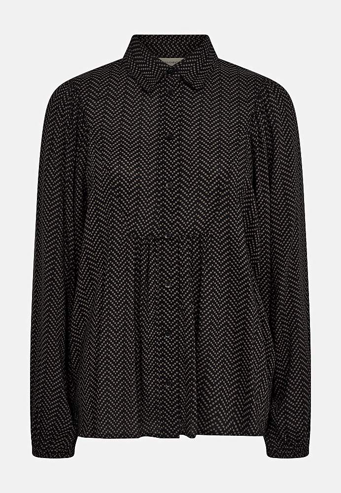 Blus med små prickar