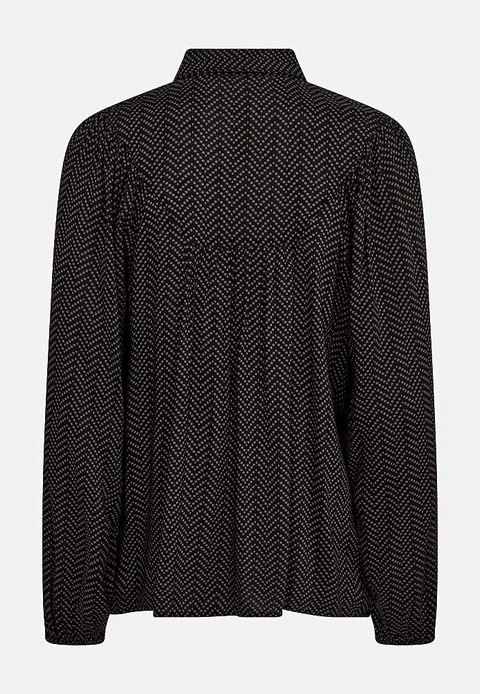 Blus med små prickar