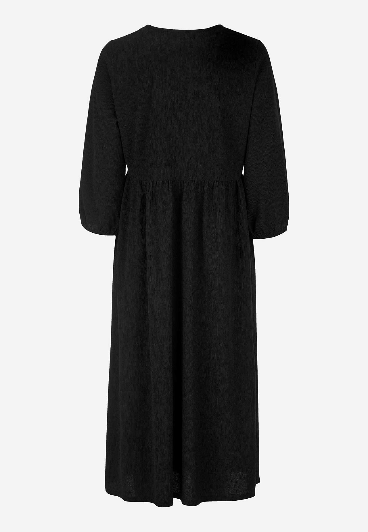 Jersey dress with structural pattern