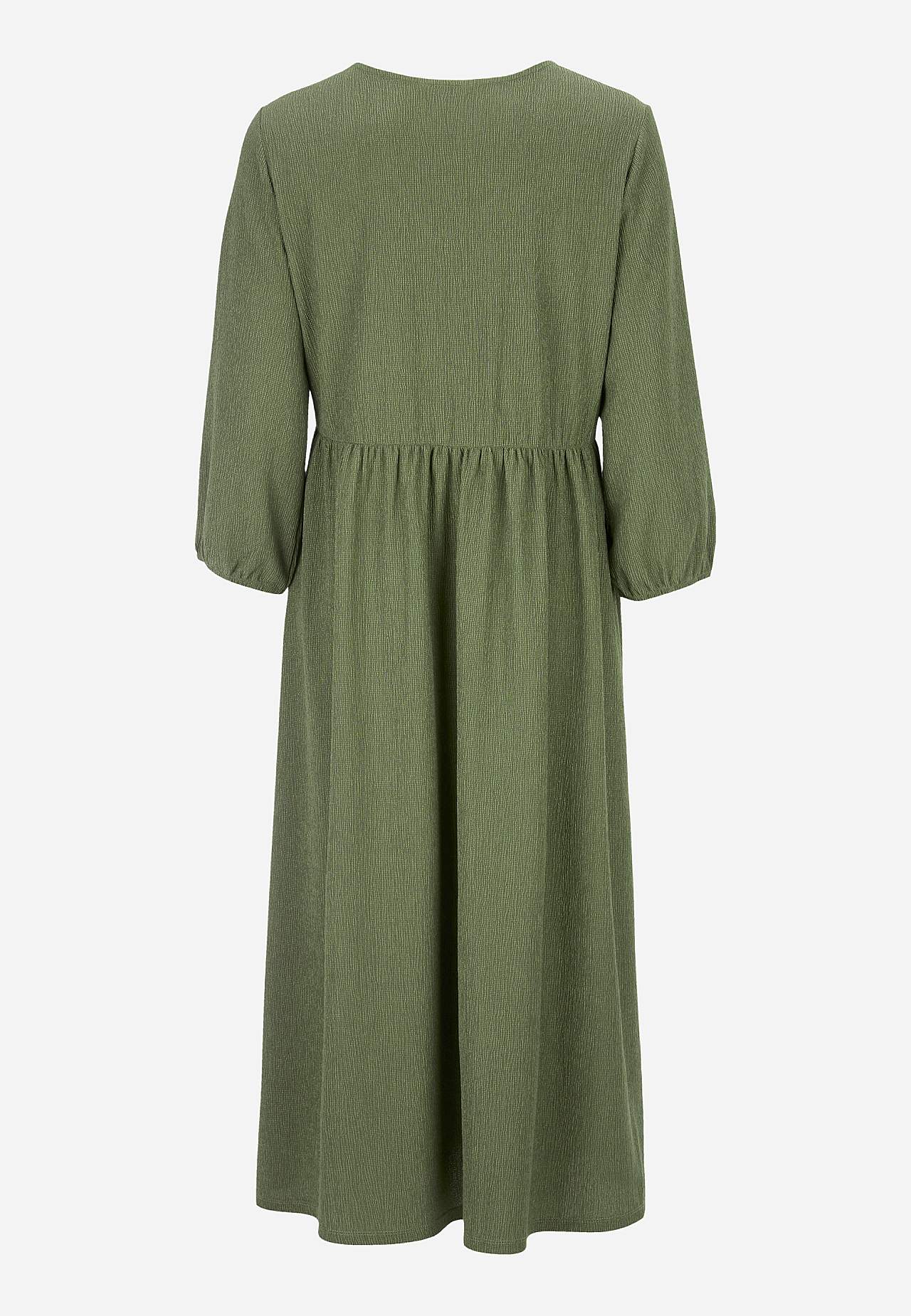 Jersey dress with structural pattern