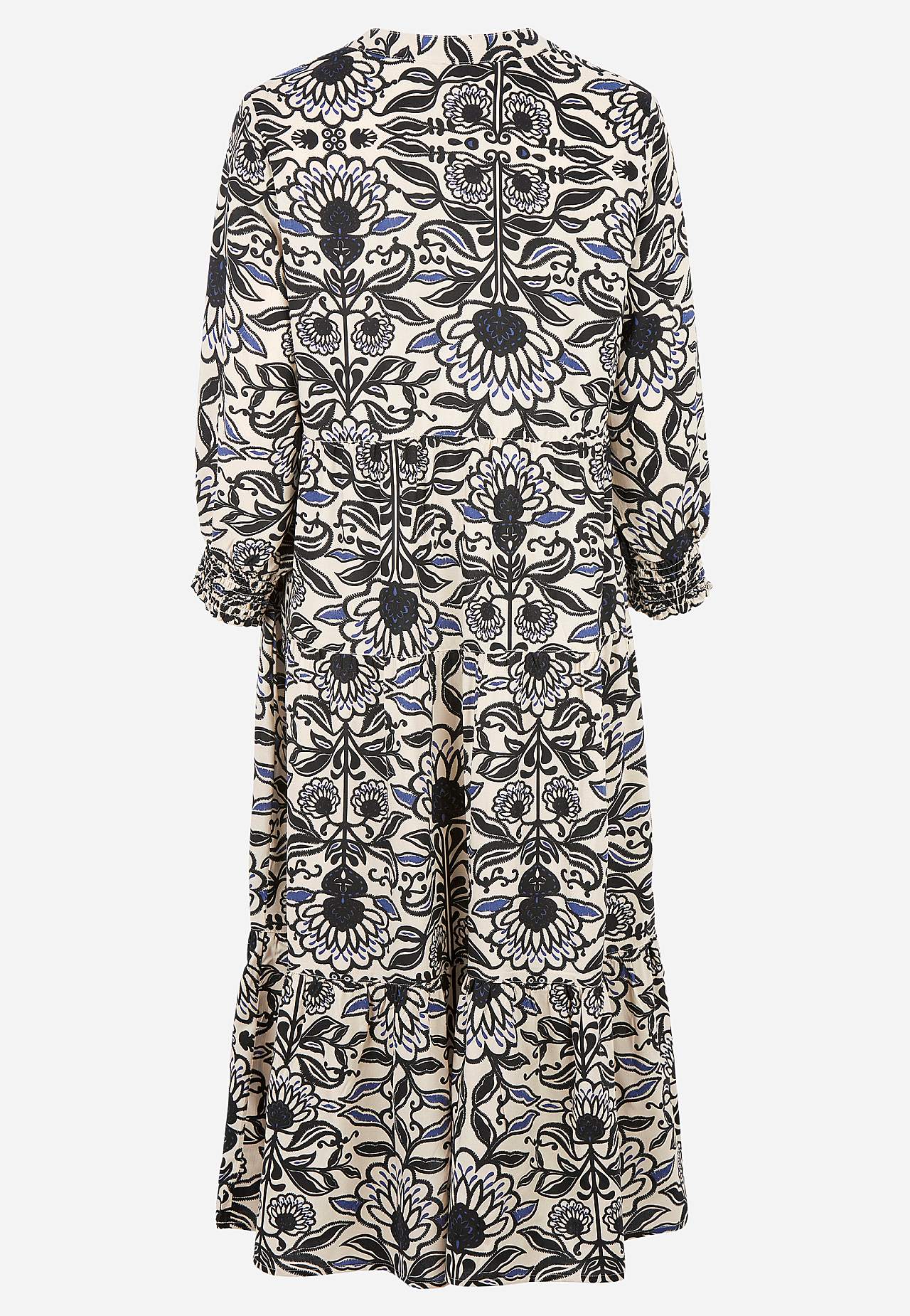 Dress with flounces