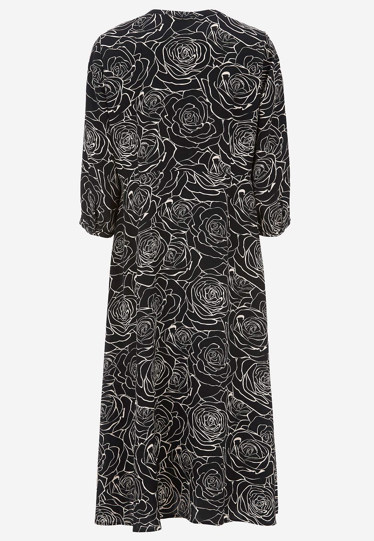 Dress in viscose with a flower pattern