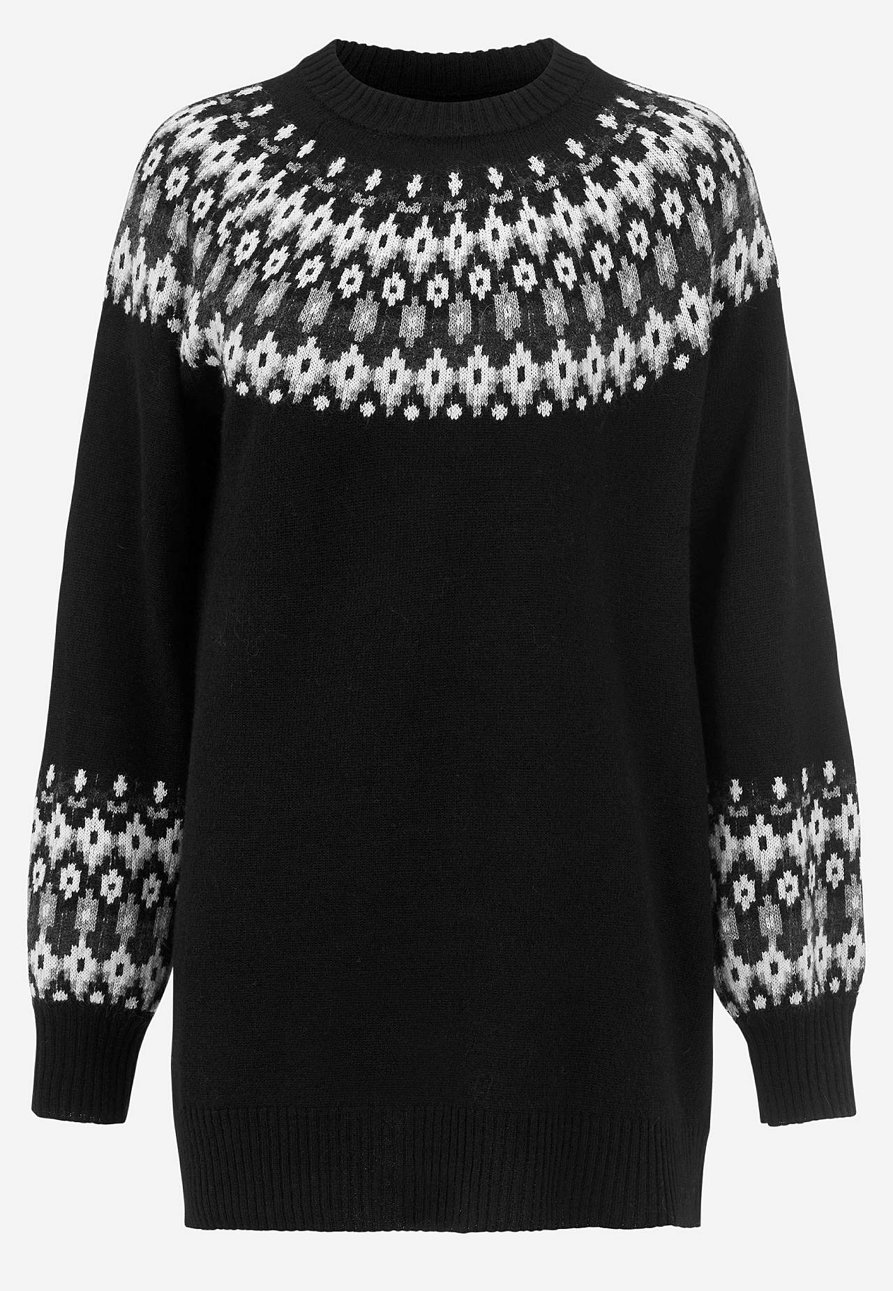 Knitted, jacquard patterned sweater