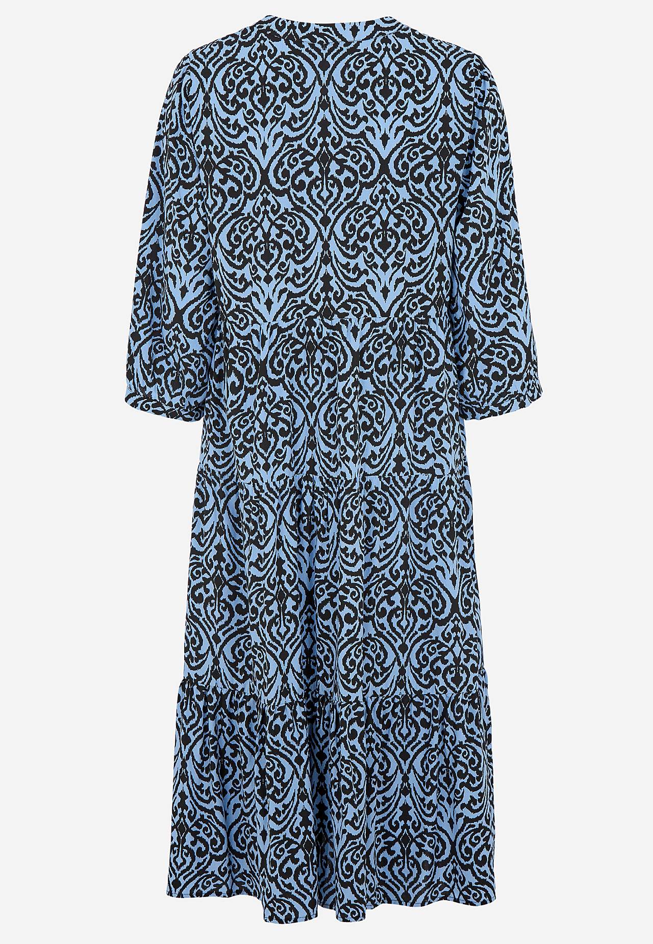 Dress with flounces