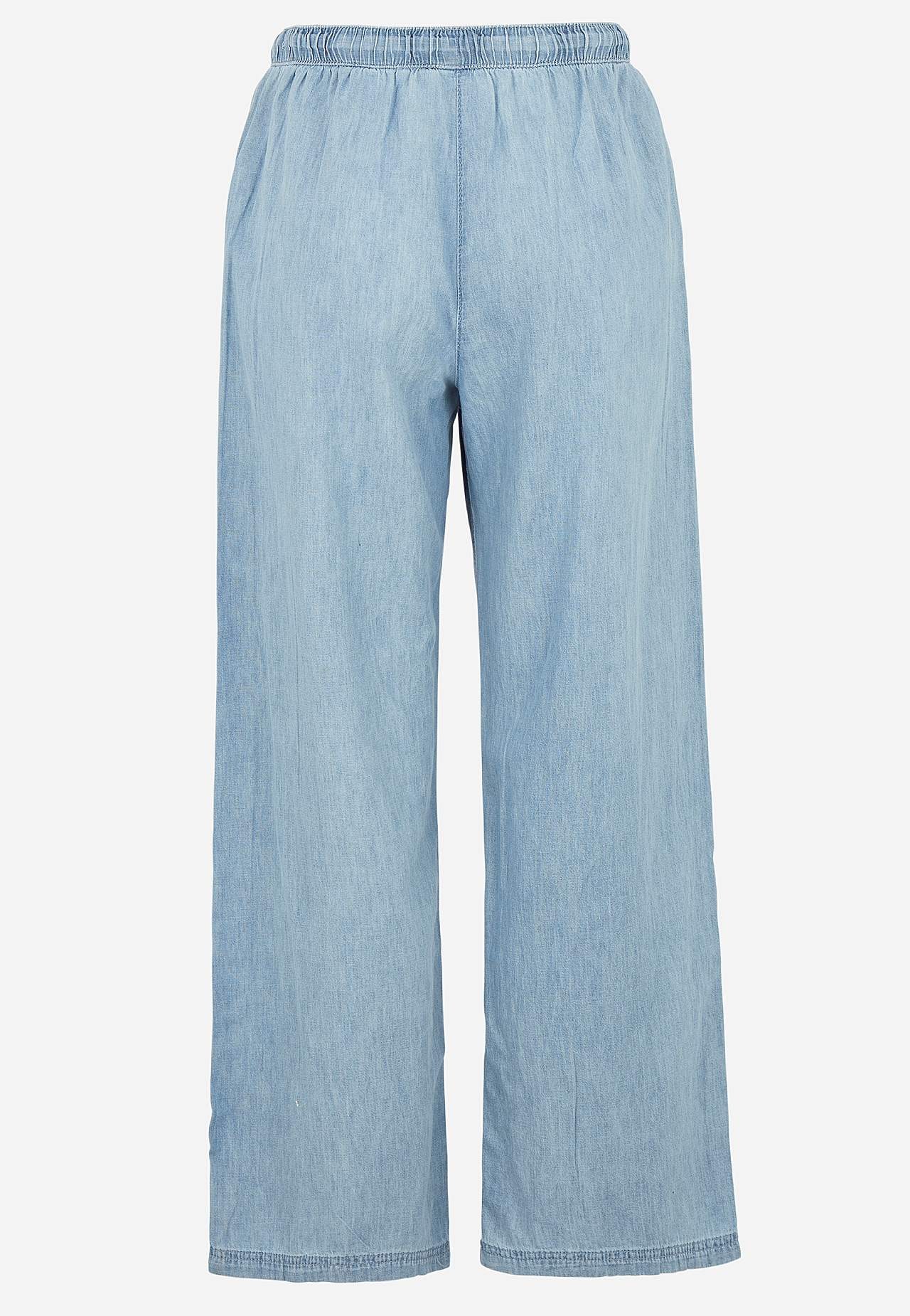 Trousers in denim with wide legs