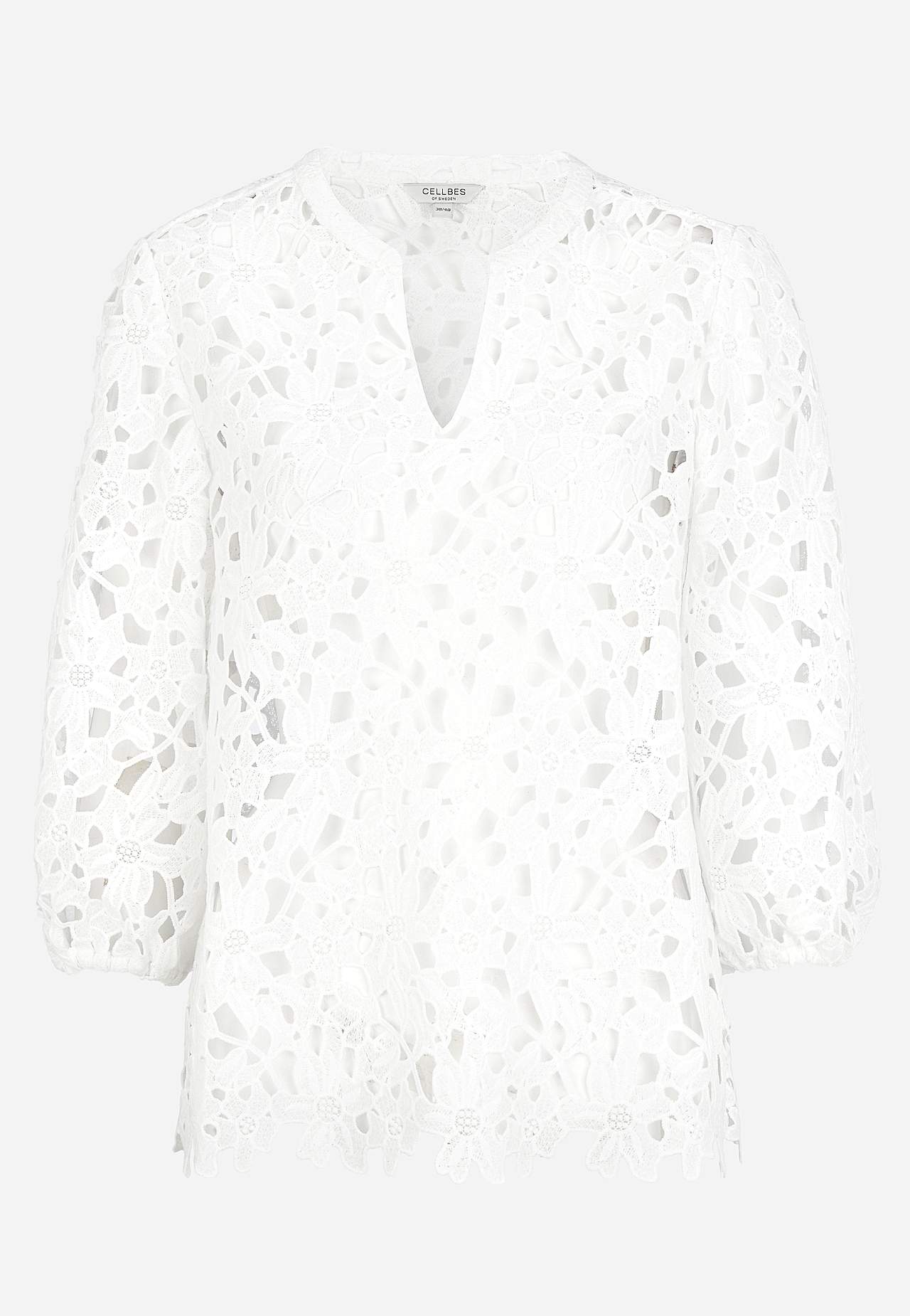 Blondebluse med et blomstermønster billede