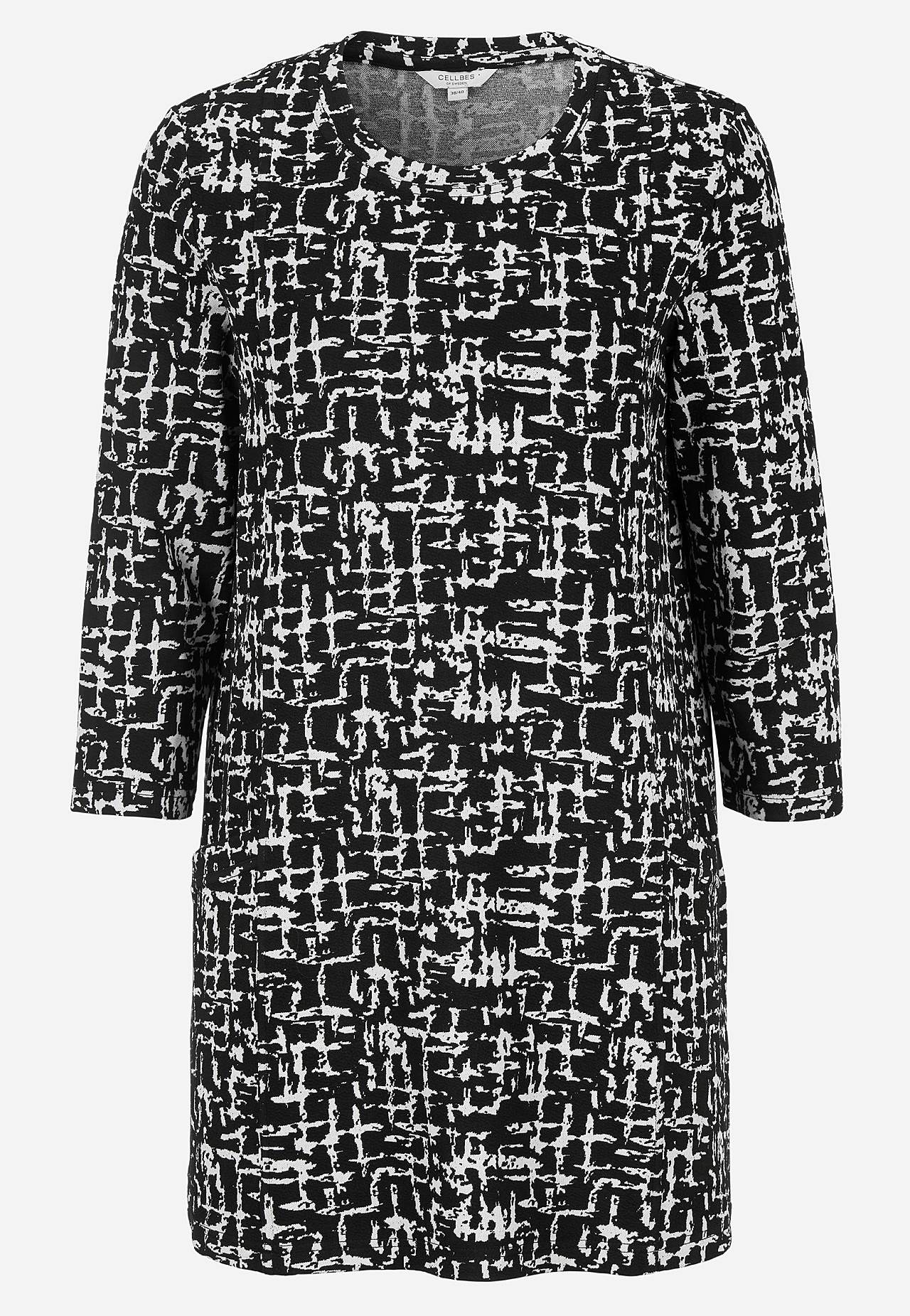 Patterned tunic top with pockets