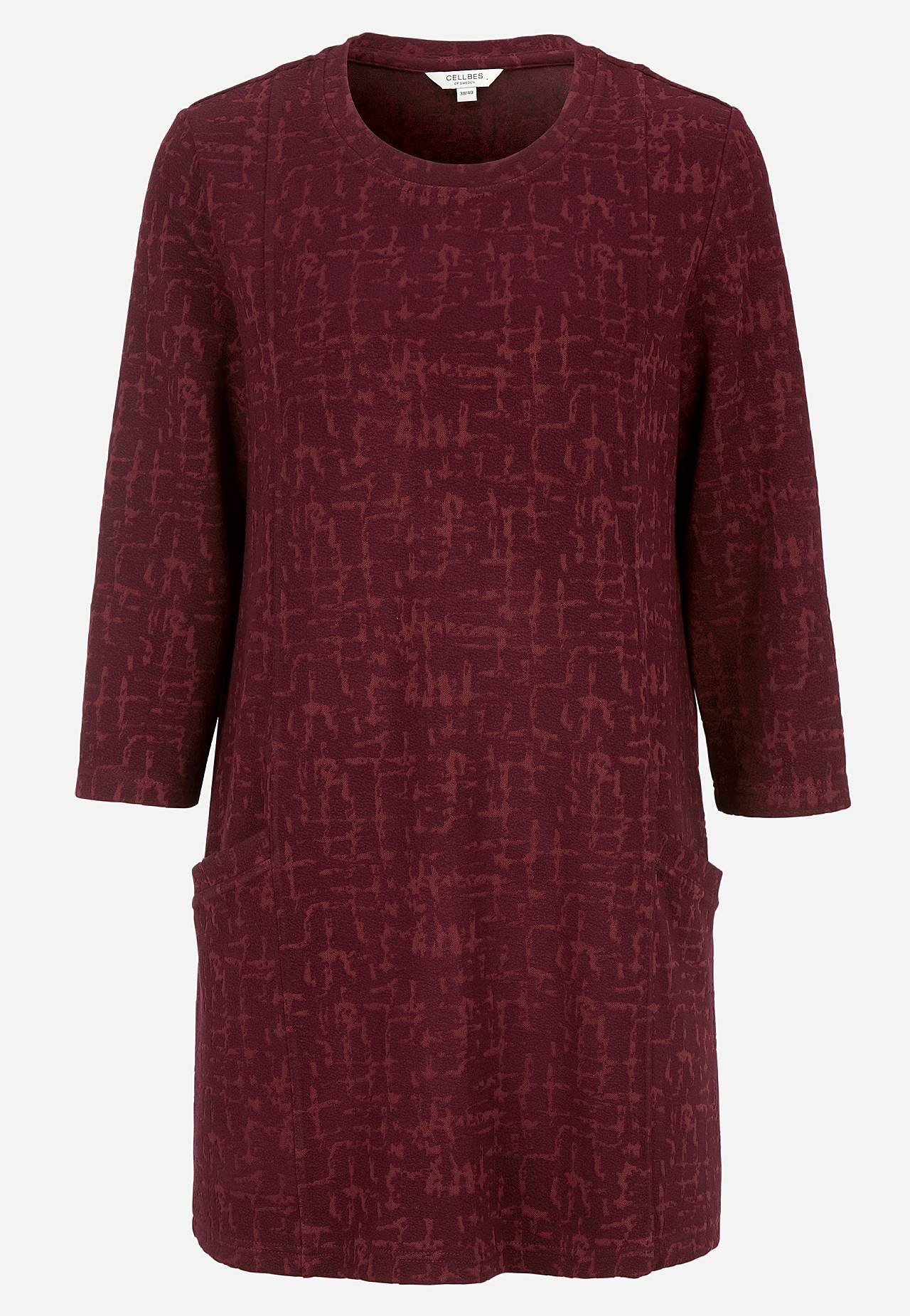 Patterned tunic top with pockets