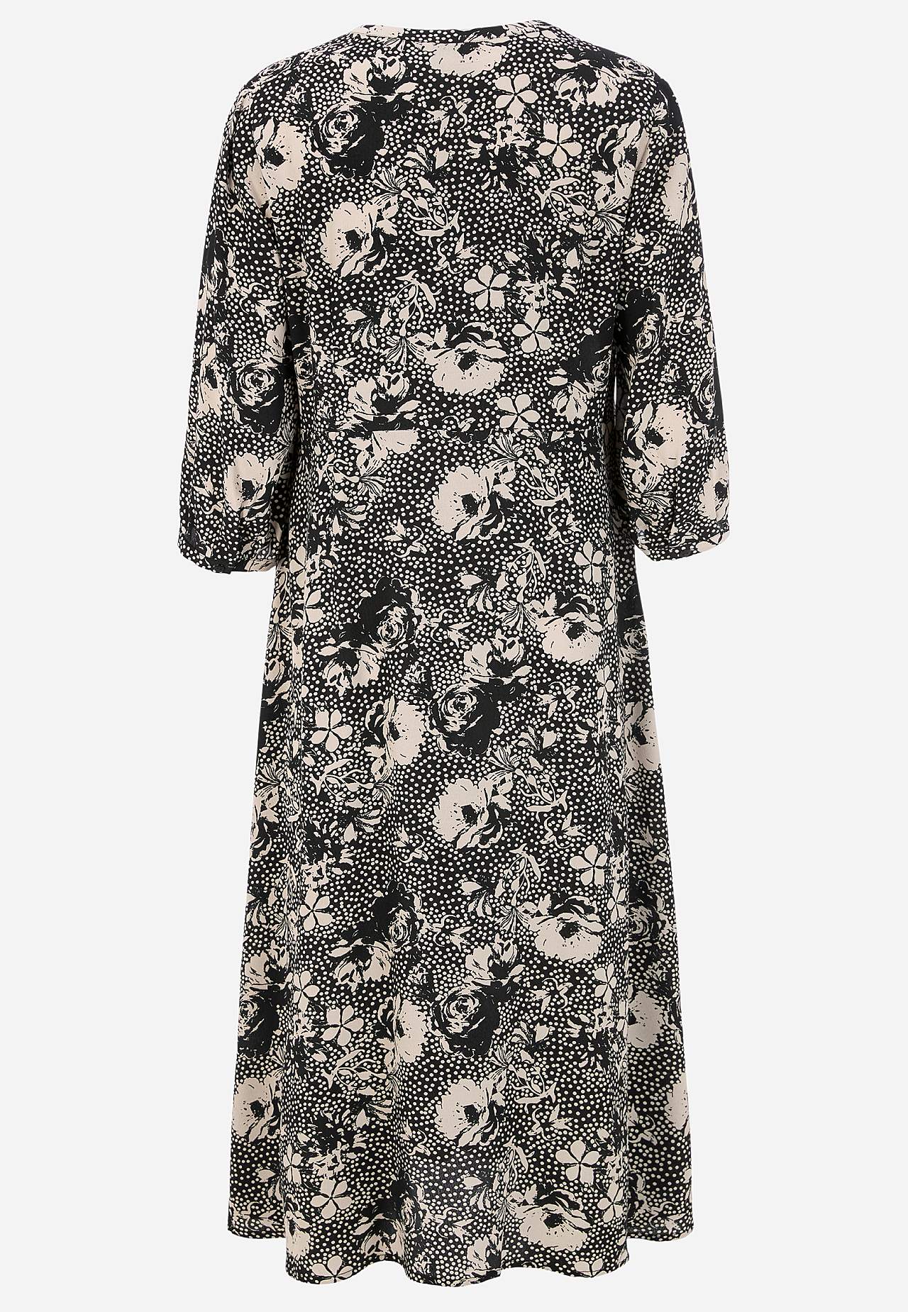Dress in viscose with a flower pattern